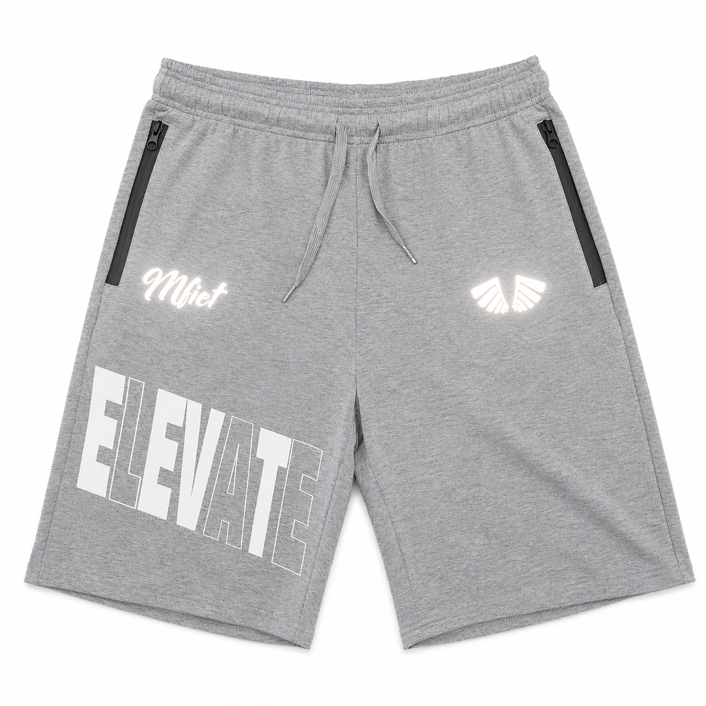 MFIET ELEVATE reflective jogger shorts in Clarity Grey featuring reflective graphics and zippered pockets.